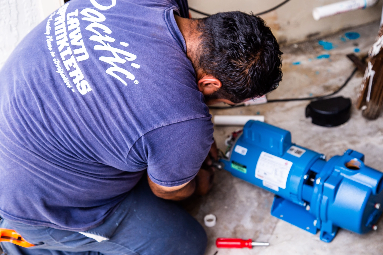 Technician completing a pump repair